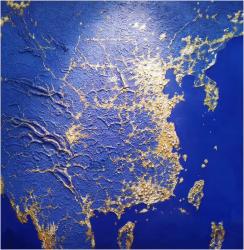 Blue Ocean Is Surrounded By Gold-Flecked Rock